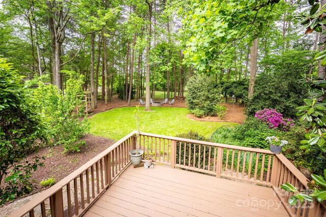 19729 Callaway Hills Ln, Davidson, NC 28036 - wooden deck featuring a lawn