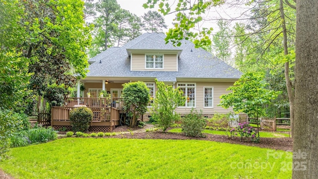 19729 Callaway Hills Ln, Davidson, NC 28036 - rear view of house featuring a deck, a shingled roof, fence, a yard, and ceiling fan