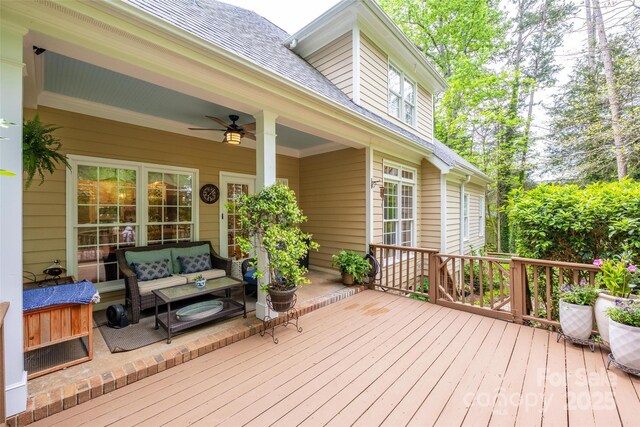 19729 Callaway Hills Ln, Davidson, NC 28036 - wooden deck featuring outdoor lounge area and ceiling fan