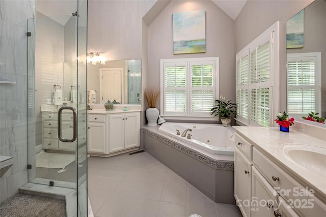 19729 Callaway Hills Ln, Davidson, NC 28036 - bathroom featuring tile patterned floors, two vanities, a sink, a stall shower, and a tub with jets