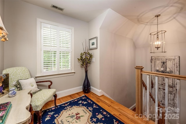 19729 Callaway Hills Ln, Davidson, NC 28036 - sitting room featuring baseboards, wood finished floors, visible vents, and an upstairs landing