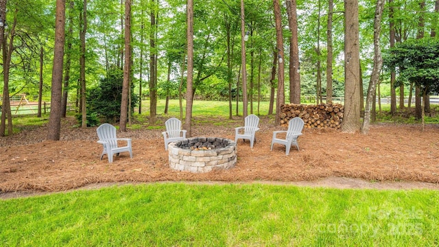 19729 Callaway Hills Ln, Davidson, NC 28036 - view of yard featuring a fire pit