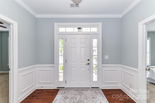 11123 Bailey Park Nature Dr, Cornelius, NC 28031 - entrance foyer with visible vents, a healthy amount of sunlight, dark wood-style floors, and wainscoting