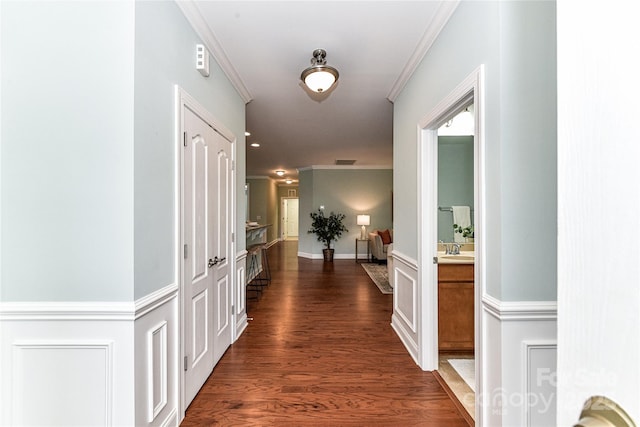 11123 Bailey Park Nature Dr, Cornelius, NC 28031 - corridor featuring visible vents, dark wood-style floors, a sink, and crown molding