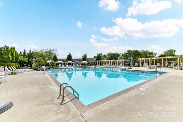 11123 Bailey Park Nature Dr, Cornelius, NC 28031 - community pool featuring a pergola and a patio