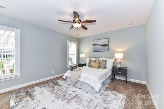 11123 Bailey Park Nature Dr, Cornelius, NC 28031 - carpeted bedroom with visible vents, baseboards, and ceiling fan