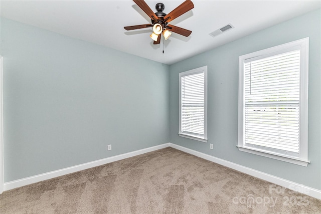 11123 Bailey Park Nature Dr, Cornelius, NC 28031 - carpeted spare room featuring baseboards, visible vents, and ceiling fan