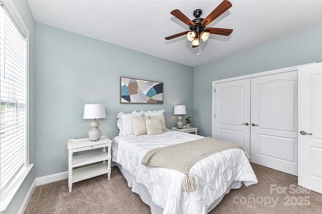 11123 Bailey Park Nature Dr, Cornelius, NC 28031 - carpeted bedroom featuring baseboards, a closet, and ceiling fan