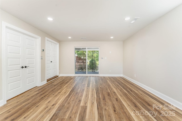 112 Circle Dr, Salisbury, NC 28144 - empty room with light wood-style floors, baseboards, and recessed lighting