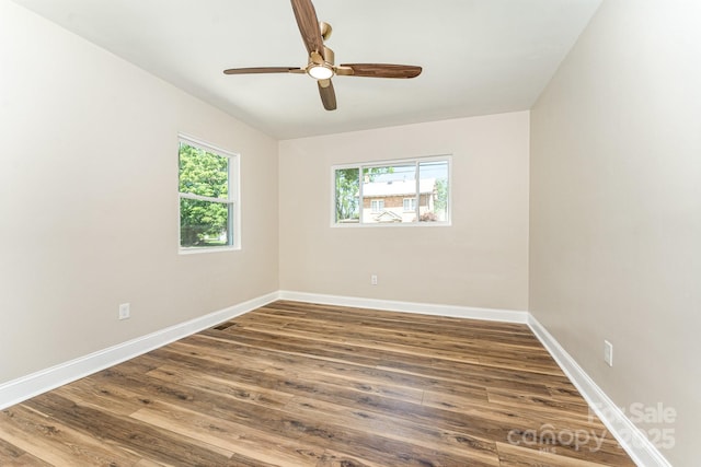 112 Circle Dr, Salisbury, NC 28144 - spare room featuring wood finished floors, baseboards, and a ceiling fan