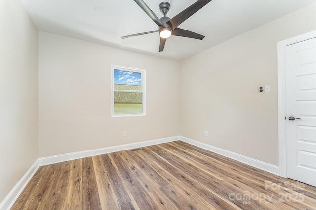 112 Circle Dr, Salisbury, NC 28144 - spare room featuring a ceiling fan, wood finished floors, and baseboards