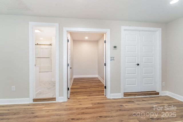 112 Circle Dr, Salisbury, NC 28144 - corridor featuring light wood-style floors, recessed lighting, and baseboards