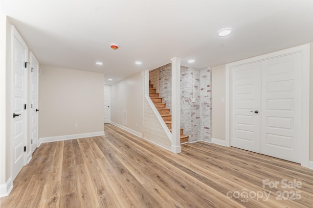 112 Circle Dr, Salisbury, NC 28144 - finished below grade area featuring light wood-style floors, baseboards, stairway, and recessed lighting
