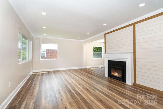 112 Circle Dr, Salisbury, NC 28144 - unfurnished living room featuring a fireplace, baseboards, recessed lighting, wood finished floors, and crown molding