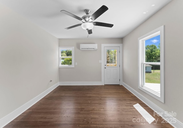 155 Jackson Rd, Salisbury, NC 28146 - interior space featuring baseboards, dark wood finished floors, ceiling fan, and a wall mounted AC