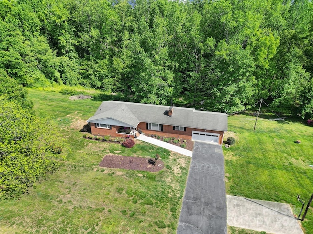 bird's eye view with a forest view