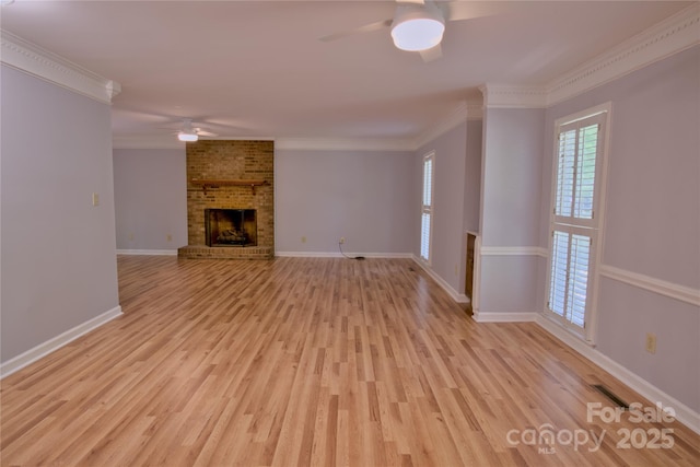 10708 Danesway Ln, Cornelius, NC 28031 - unfurnished living room with light wood-style flooring, baseboards, a fireplace, and ceiling fan