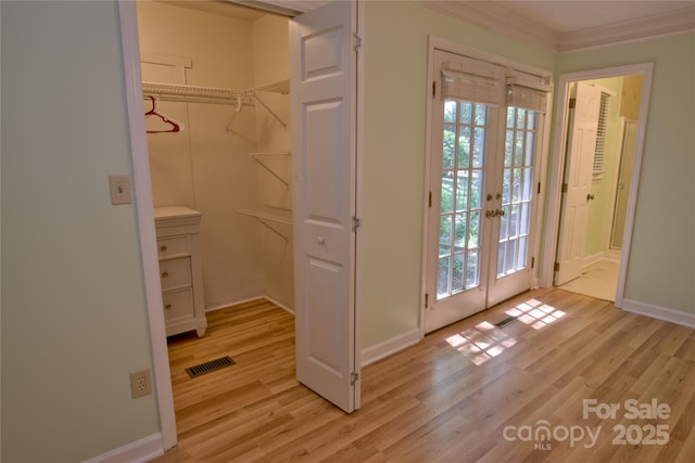 10708 Danesway Ln, Cornelius, NC 28031 - doorway to outside with light wood-type flooring, plenty of natural light, french doors, and visible vents