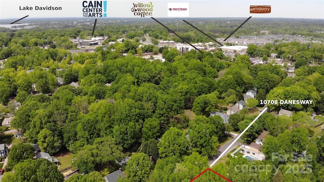10708 Danesway Ln, Cornelius, NC 28031 - birds eye view of property featuring a wooded view