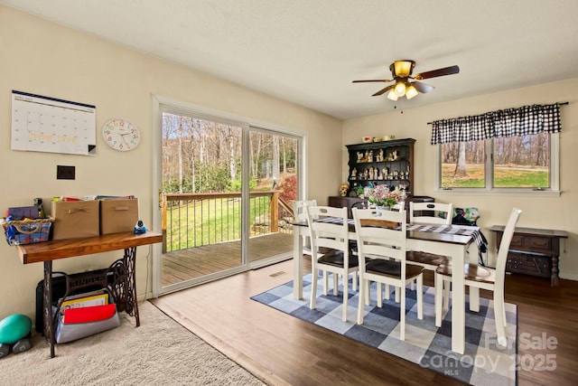 675 Rodgers Rd, Newland, NC 28657 - dining space with a ceiling fan and wood finished floors