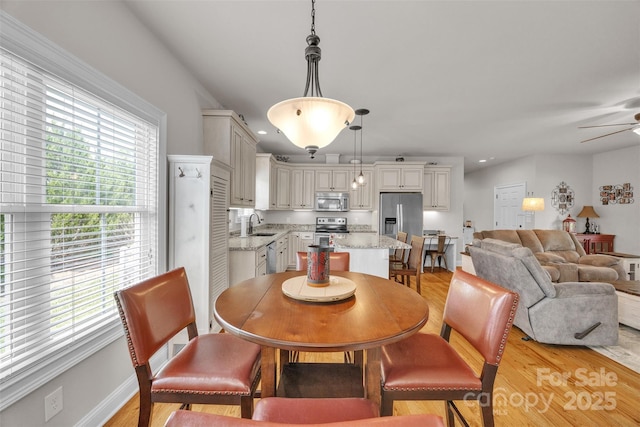 dining room featuring recessed lighting, light wood-style floors, and ceiling fan