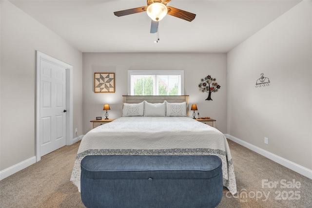 bedroom featuring carpet floors, a ceiling fan, and baseboards
