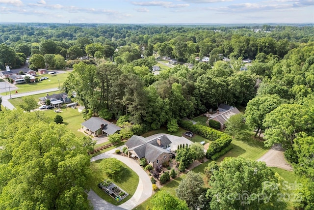 bird's eye view featuring a residential view and a view of trees
