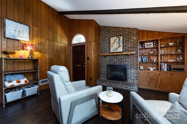 846 Gist Rd, Rock Hill, SC 29732 - living room with vaulted ceiling with beams, wooden walls, dark wood-style floors, and a fireplace