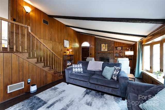 846 Gist Rd, Rock Hill, SC 29732 - living area with wood walls, lofted ceiling with beams, visible vents, and a fireplace
