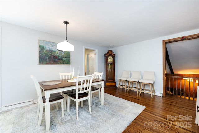 846 Gist Rd, Rock Hill, SC 29732 - dining area featuring wood finished floors and a baseboard heating unit