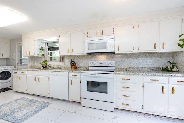 846 Gist Rd, Rock Hill, SC 29732 - kitchen with a sink, white appliances, washer / clothes dryer, white cabinetry, and tasteful backsplash