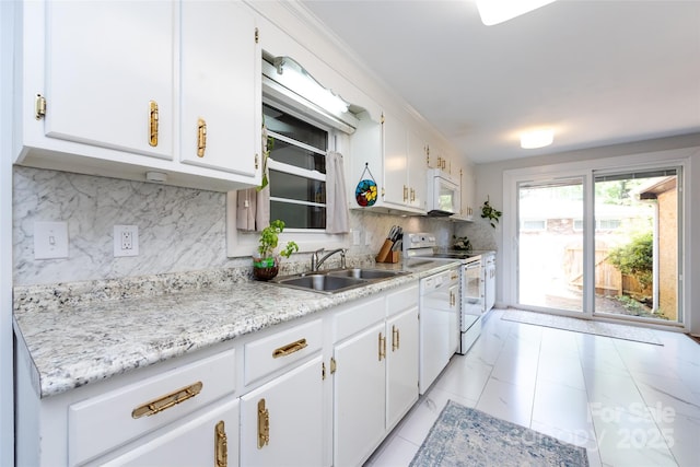 846 Gist Rd, Rock Hill, SC 29732 - kitchen with white appliances, white cabinetry, a sink, and light countertops