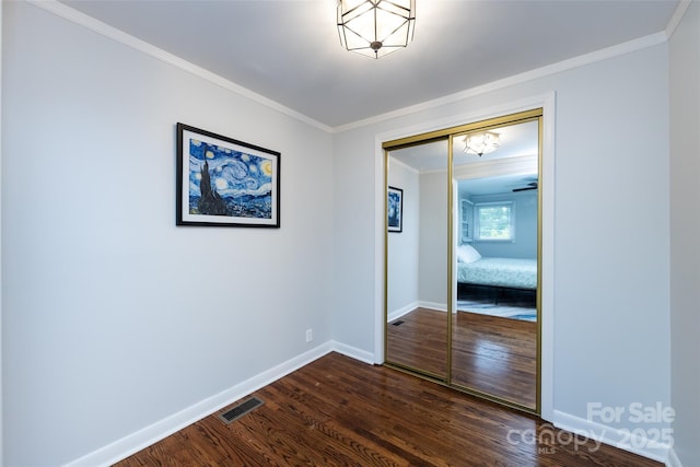 846 Gist Rd, Rock Hill, SC 29732 - interior space with visible vents, baseboards, a closet, dark wood-style floors, and ornamental molding