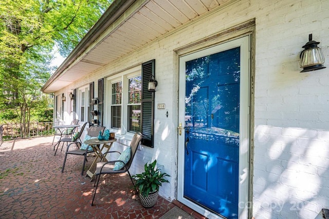 310 1st St NE, Hickory, NC 28601 - doorway to property featuring concrete block siding and covered porch