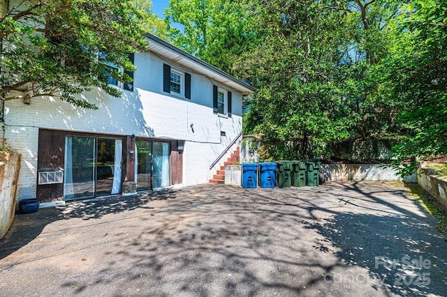 310 1st St NE, Hickory, NC 28601 - rear view of property with a patio area and stairs