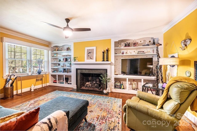 310 1st St NE, Hickory, NC 28601 - living room with ceiling fan, baseboards, crown molding, and wood finished floors