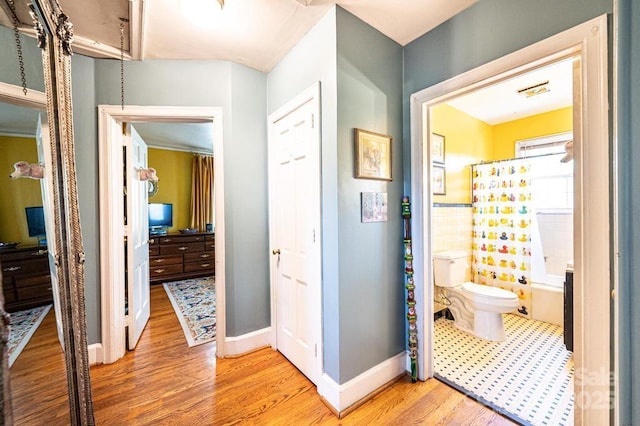 310 1st St NE, Hickory, NC 28601 - hall featuring light wood-style flooring, visible vents, and baseboards