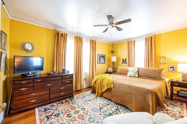310 1st St NE, Hickory, NC 28601 - bedroom featuring ceiling fan, ornamental molding, and wood finished floors