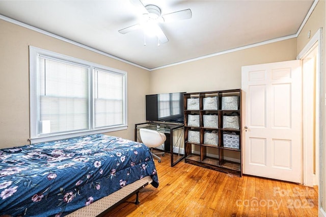 310 1st St NE, Hickory, NC 28601 - bedroom featuring a ceiling fan, wood finished floors, and ornamental molding