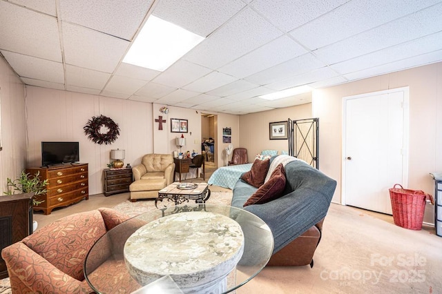 310 1st St NE, Hickory, NC 28601 - carpeted living area featuring a paneled ceiling and a decorative wall