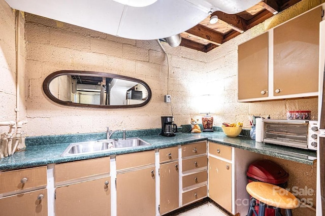 310 1st St NE, Hickory, NC 28601 - kitchen with a toaster, dark countertops, open shelves, and a sink