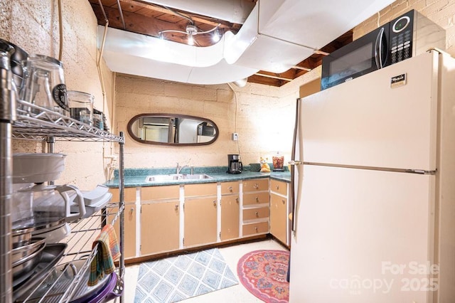 310 1st St NE, Hickory, NC 28601 - kitchen featuring freestanding refrigerator and a sink