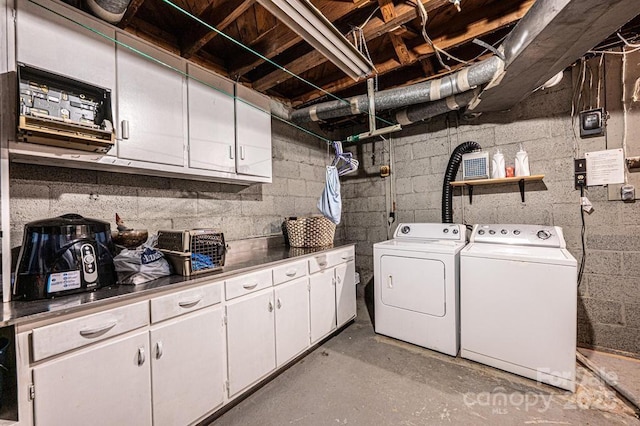 310 1st St NE, Hickory, NC 28601 - washroom featuring cabinet space and washer and clothes dryer