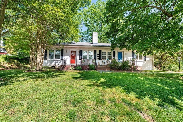 310 1st St NE, Hickory, NC 28601 - ranch-style house with a chimney, a front yard, and covered porch