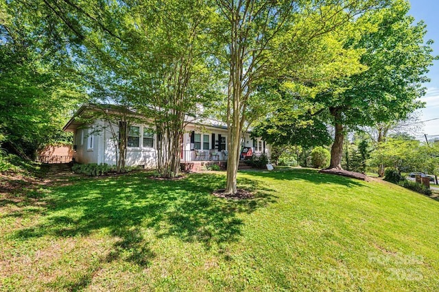 310 1st St NE, Hickory, NC 28601 - view of front of home featuring covered porch and a front yard