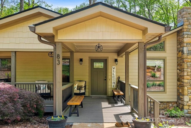entrance to property with a porch