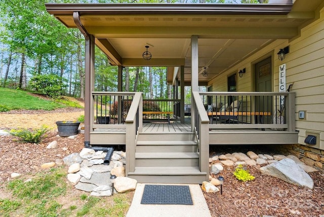 wooden deck featuring covered porch