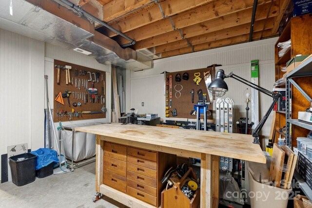 basement with a workshop area