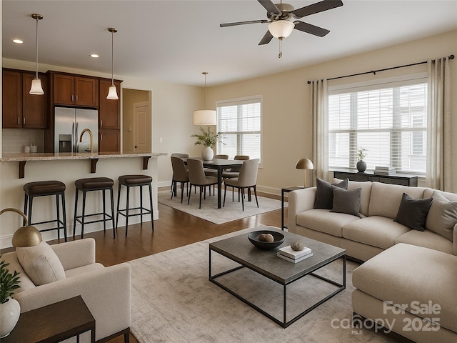 19 Tudor Way, Black Mountain, NC 28711 - living room with dark wood-type flooring, ceiling fan, recessed lighting, and baseboards