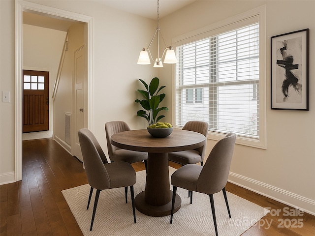 19 Tudor Way, Black Mountain, NC 28711 - dining area featuring baseboards and dark wood-type flooring